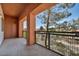Balcony with black iron railings and privacy from trees at 23 E Agate Ave # 308, Las Vegas, NV 89123