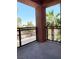 Balcony with metal railing offers outdoor living and panoramic views of palm trees at 23 E Agate Ave # 308, Las Vegas, NV 89123