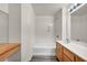 Clean bathroom showcasing a tub with shower, vanity, and modern fixtures at 23 E Agate Ave # 308, Las Vegas, NV 89123