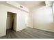 Bright bedroom with grey vinyl flooring and a closet, ready for personalization and comfortable living at 23 E Agate Ave # 308, Las Vegas, NV 89123