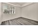 Bright bedroom features a large window and stylish floors at 23 E Agate Ave # 308, Las Vegas, NV 89123