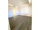Spacious bedroom showcasing modern vinyl flooring and ample natural light, perfect for a relaxing retreat at 23 E Agate Ave # 308, Las Vegas, NV 89123