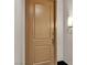 Condo front door and entryway to unit 308 with light fixture at 23 E Agate Ave # 308, Las Vegas, NV 89123