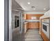 Modern kitchen with stainless steel appliances, granite countertops, and light wood cabinetry at 23 E Agate Ave # 308, Las Vegas, NV 89123