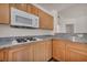 Efficient kitchen features granite countertops, stainless steel appliances, and modern fixtures at 23 E Agate Ave # 308, Las Vegas, NV 89123