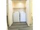 Convenient laundry closet featuring a washer and dryer for in-unit laundry services at 23 E Agate Ave # 308, Las Vegas, NV 89123