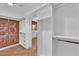 Spacious closet featuring built-in shelving and a glimpse into the luxurious bathroom at 2825 Brianwood Ct, Las Vegas, NV 89134