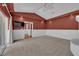 Large main bedroom with carpet, a ceiling fan and a doorway to a room with hardwood floors at 2825 Brianwood Ct, Las Vegas, NV 89134