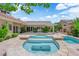 View of backyard pool, spa, patio and exterior of home at 2825 Brianwood Ct, Las Vegas, NV 89134