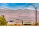 Panoramic view of mountains and the cityscape from the property, offering a serene backdrop at 3050 Canal Walk Rd, Henderson, NV 89052