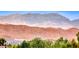 Gorgeous mountain view from the property with lush greenery in the foreground at 3050 Canal Walk Rd, Henderson, NV 89052
