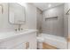 Updated bathroom with modern vanity, quartz countertops, and a tiled shower at 3086 Cardinal Dr, Las Vegas, NV 89121