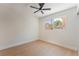 Bright bedroom with wood-look floors, modern ceiling fan, and window at 3086 Cardinal Dr, Las Vegas, NV 89121