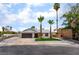 Charming single-story home with well-manicured landscaping and mature palm trees at 3086 Cardinal Dr, Las Vegas, NV 89121