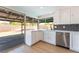 Kitchen with view of the backyard, featuring stainless steel appliances and plenty of natural light at 3086 Cardinal Dr, Las Vegas, NV 89121