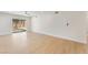 Bright living room with wood floors and sliding doors to the backyard pool area at 3086 Cardinal Dr, Las Vegas, NV 89121