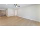 Bright living room with wood floors and entry way with wooden doors at 3086 Cardinal Dr, Las Vegas, NV 89121