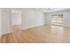 Large living room with wood floors and sliding doors to the backyard pool area at 3086 Cardinal Dr, Las Vegas, NV 89121