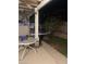 Relaxing backyard patio with outdoor seating, and well-maintained greenery at 3128 Spring City Ave, North Las Vegas, NV 89081