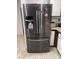 The kitchen boasts a modern, stainless steel refrigerator, perfect for storing all your groceries at 3128 Spring City Ave, North Las Vegas, NV 89081