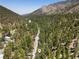 Scenic aerial view of a wooded community nestled in the mountains providing a quiet retreat at 4581 Aspen Ave, Mount Charleston, NV 89124