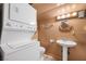 Bathroom featuring a sink and stackable washer and dryer at 4581 Aspen Ave, Mount Charleston, NV 89124