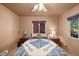 Comfortable bedroom with two windows providing great outdoor views and natural light at 4581 Aspen Ave, Mount Charleston, NV 89124