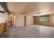 Large living room with wooden floors, bright lighting, and spacious design at 4581 Aspen Ave, Mount Charleston, NV 89124