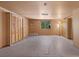 Spacious living room featuring wooden floors, ample storage, and a bright ambiance at 4581 Aspen Ave, Mount Charleston, NV 89124