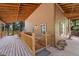 Charming porch with a wooden railing, offering a cozy spot to enjoy the surrounding natural beauty at 4581 Aspen Ave, Mount Charleston, NV 89124