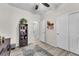 Comfortable bedroom featuring light wood flooring and white closet doors for ample storage at 4725 Blaise Ave # 103, North Las Vegas, NV 89084