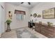 Organized bedroom with a large desk, decorative rug, and ample storage at 4725 Blaise Ave # 103, North Las Vegas, NV 89084