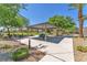 Community area with a picnic pavilion, barbecue grills, and lush landscaping creates a welcoming outdoor space at 4725 Blaise Ave # 103, North Las Vegas, NV 89084