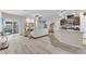 Bright open floor plan with a kitchen, living room, and patio access at 4725 Blaise Ave # 103, North Las Vegas, NV 89084
