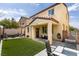 Outdoor living space featuring a patio, artificial grass, and a pergola at 5023 Salt River Ave, Las Vegas, NV 89139