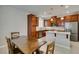 Gourmet kitchen with stainless steel appliances, granite countertops, and a breakfast bar at 5023 Salt River Ave, Las Vegas, NV 89139