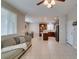 Open-concept living room showcasing the dining area and kitchen with an island and stainless appliances at 5023 Salt River Ave, Las Vegas, NV 89139