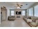 Spacious living room with tile floors, large windows, and modern decor at 5023 Salt River Ave, Las Vegas, NV 89139