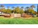 The Sienna neighborhood entrance with stone signage and manicured landscaping at 5147 Progresso St, Las Vegas, NV 89135