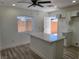 Modern kitchen with a center island, stylish lighting, and new appliances at 532 N 9Th St, Las Vegas, NV 89101