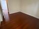 Cozy bedroom featuring hardwood floors and neutral walls at 5824 Red Gull St, Las Vegas, NV 89149