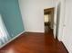 Bright bedroom featuring hardwood floors and a fresh coat of paint at 5824 Red Gull St, Las Vegas, NV 89149