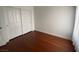 Bedroom featuring hardwood floors and a sliding door closet at 5824 Red Gull St, Las Vegas, NV 89149