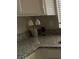 Close-up of granite countertop with wine glasses and decorative bucket at 5824 Red Gull St, Las Vegas, NV 89149
