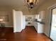 Bright, updated kitchen featuring white cabinets and modern appliances at 5824 Red Gull St, Las Vegas, NV 89149