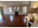 Inviting living room with cozy fireplace, wood floors, and ample natural light at 5824 Red Gull St, Las Vegas, NV 89149