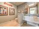 Chic powder room featuring a modern floating vanity and decorative tile at 583 Saint Croix St, Henderson, NV 89012