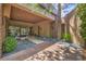 Stylish front entrance with stone accents, glass doors, and tasteful landscaping at 583 Saint Croix St, Henderson, NV 89012