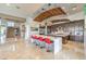 Spacious kitchen with a large island, stainless steel appliances, and modern lighting fixtures at 583 Saint Croix St, Henderson, NV 89012
