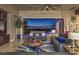Comfortable living room featuring large windows with a stunning city view and modern furnishings at 583 Saint Croix St, Henderson, NV 89012